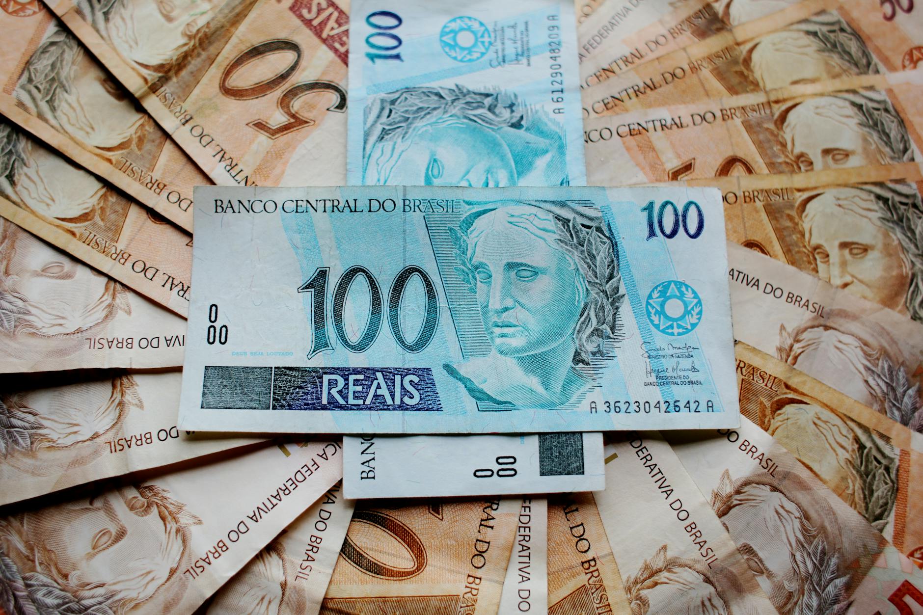 GOP Senators Push DOGE Savings at Treasury Inspired by Musk 1 Close-up of Brazilian Real banknotes featuring different denominations and intricate designs. - GOP Senators Push DOGE Savings at Treasury Inspired by Musk