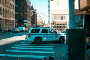 Shocking Crash: SUV Slams NYPD Cruiser – 4 Injured, 1 Arrested!